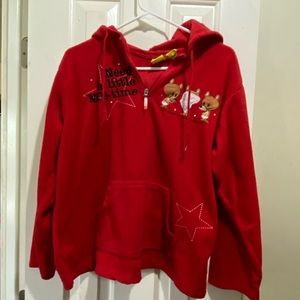 red fuzzy zip up